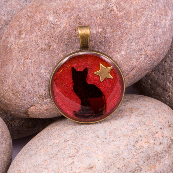 Handcrafted Bespoke Curious Cat Pendant; set in bronze effect metal bezel.| Jabbawocky Crafts (jabbawockycrafts.co.uk)
