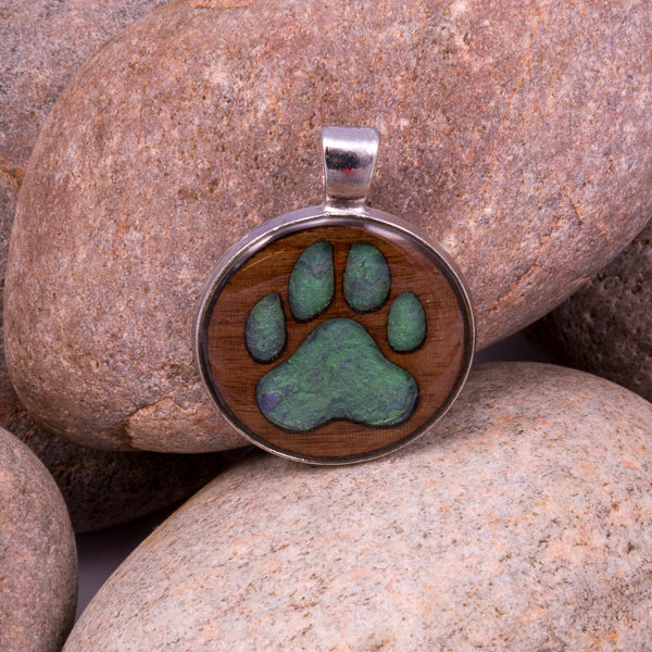 Handcrafted Bespoke Dog Paw Print Pendant; set in A Dog Pawprint (made from gilted walnut)| Jabbawocky Crafts (jabbawockycrafts.co.uk)