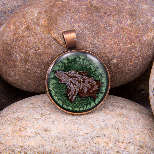Handcrafted Bespoke Howling Wolf Pendant; set in Copper Effect metal bezel.| Jabbawocky Crafts (jabbawockycrafts.co.uk)